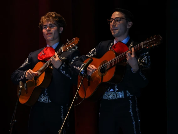 2 members of Mariachi Arizona playing instruments