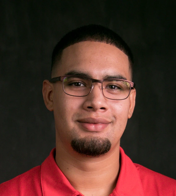 Student wearing red polo